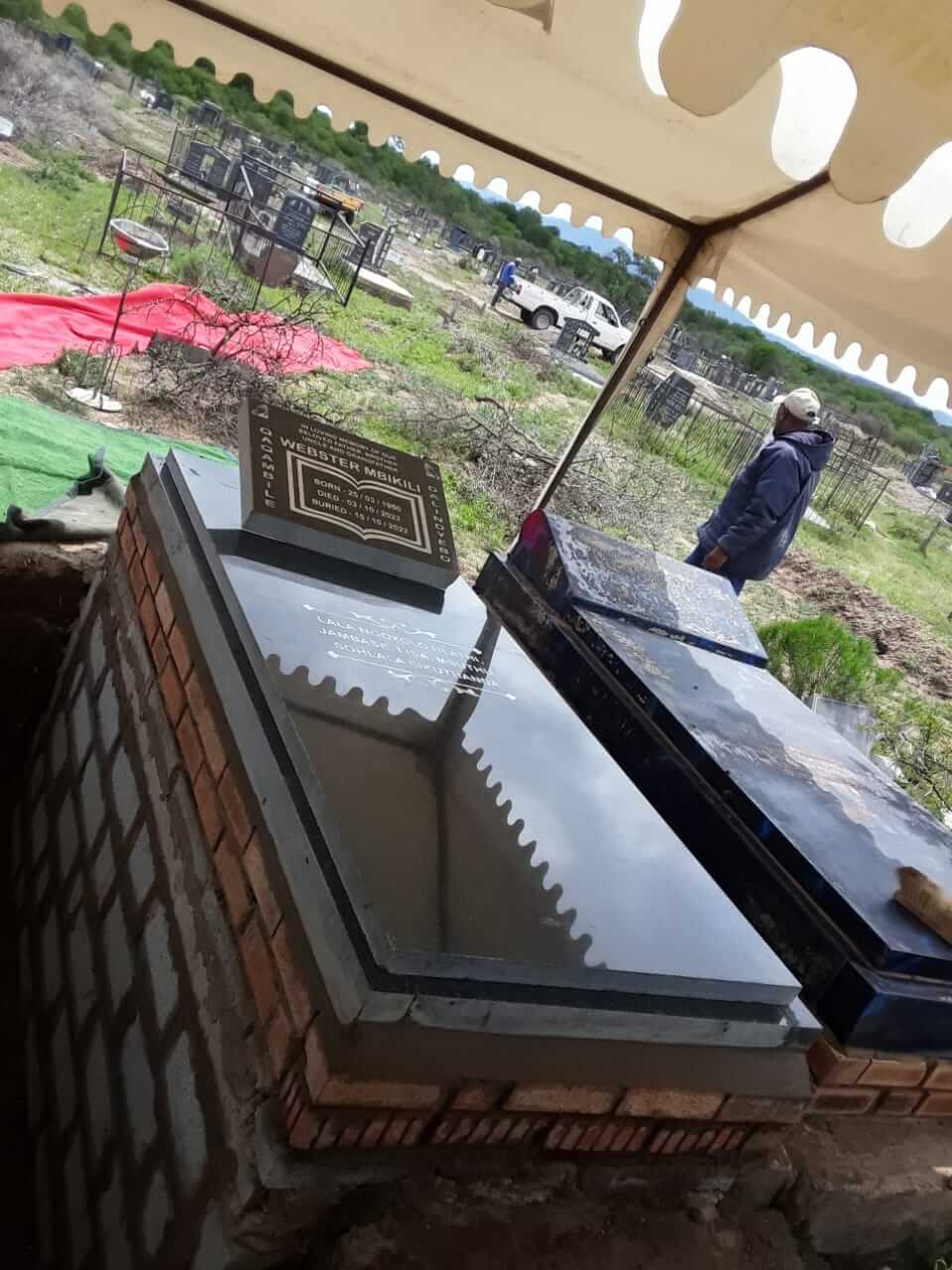 D23 with slab tombstone